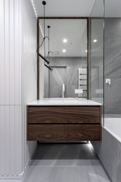 istock Modern basin with water tap in new contemporary bathroom 1186990552