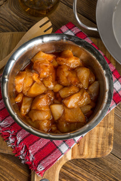 istock Chunks of chicken in marinade. 1186992008
