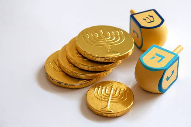 hanukkah jewish holiday concept with chocolate coins and dreidel - chocolate coins imagens e fotografias de stock