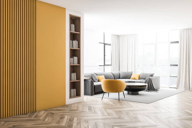 istock White and yellow living room corner with bookcase 1186993559