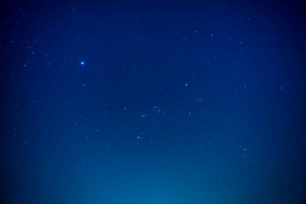 istock Night dark sky with bright stars 1186995311
