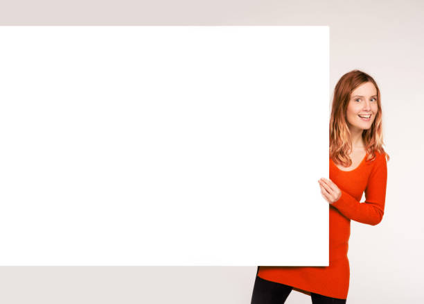 woman holding a white banner