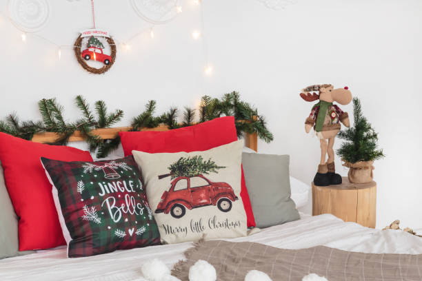 istock White loft style bedroom with Christmas tree and decoration 1186996294