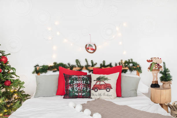 istock Bed with pillows with red Christmas decor 1186996335
