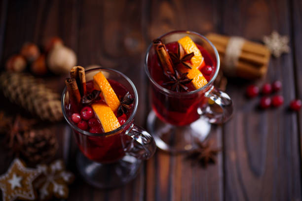 Hot spiced mulled wine with cranberry and orange