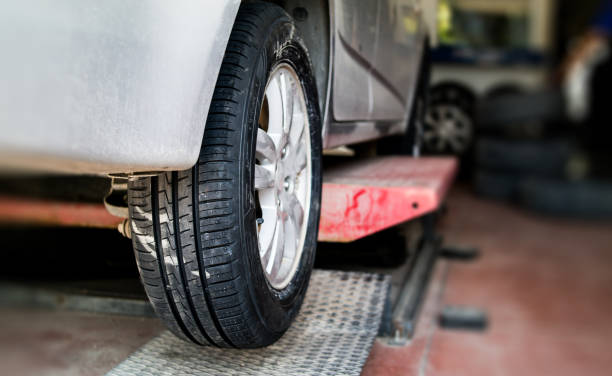 istock car tire maintenance and replacement in garage 1187000693