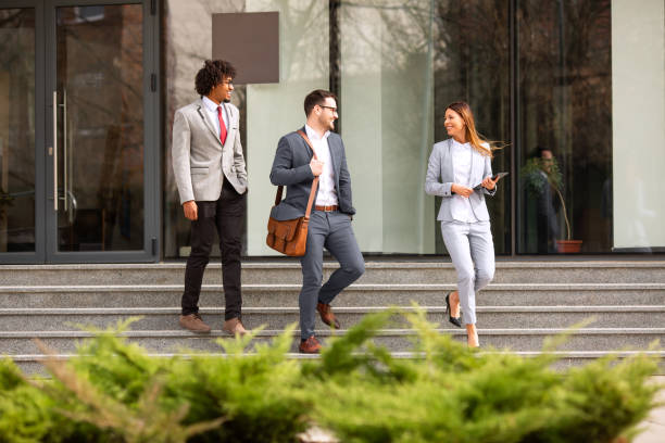 istock A manager and his subordinate escorting a business partner. 1187000926