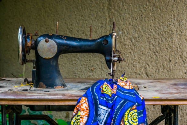 istock old vintage sewing machine with a fabric, Nostalgic equipment, Tailoring background 1187002123