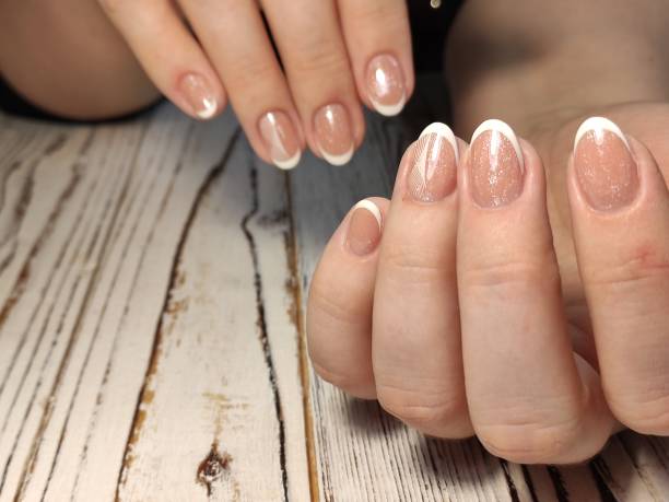 istock Beautiful woman's nails with beautiful christmas manicure 1187004690