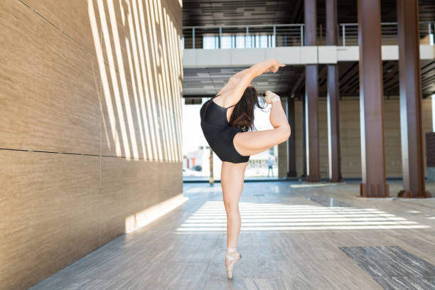 istock Skilled ballet dancer performing on street 1187005945