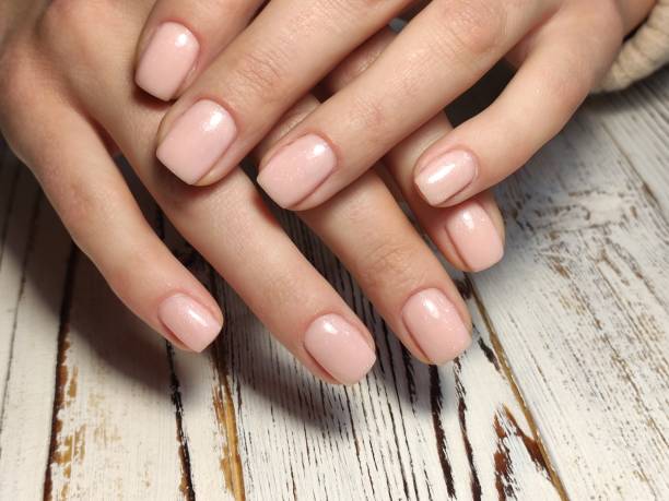 istock stylish design of manicure on beautiful nails 1187005958