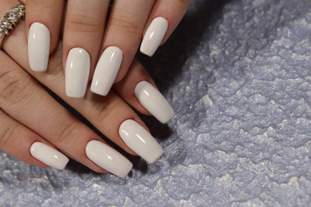 istock fashionable white manicure 1187008034