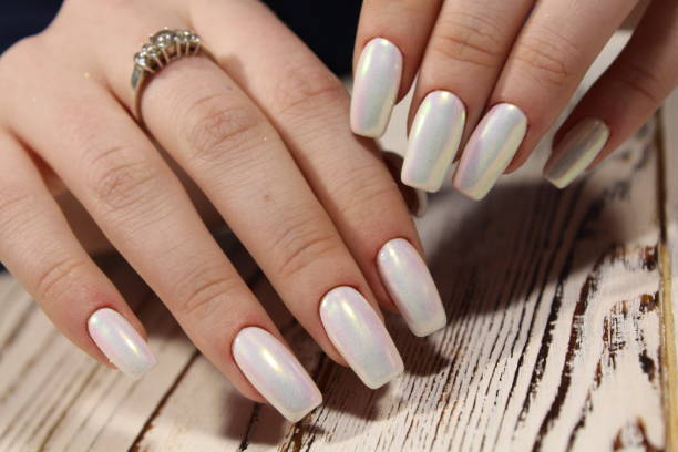 istock fashionable white manicure 1187008244