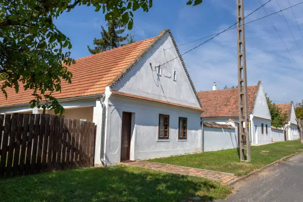 Photo of Traditional Swabian houses in Magyarpolany, Hungary.