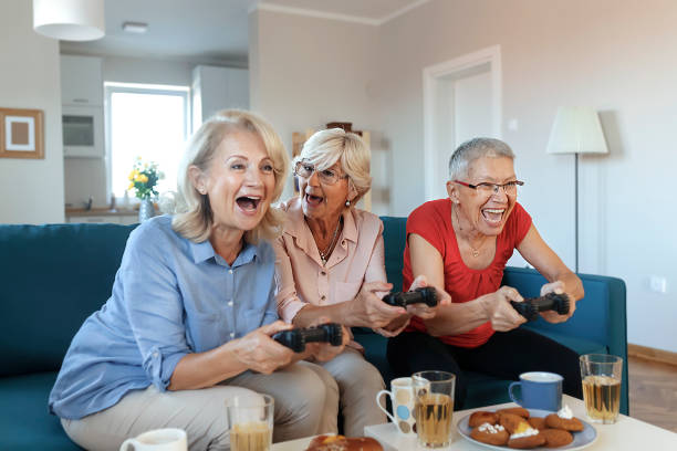 istock Senior Female Friends Playing Video Game 1187012045