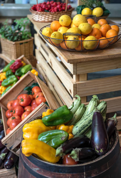 istock Vegetables and herbs in open market stall 1187013634