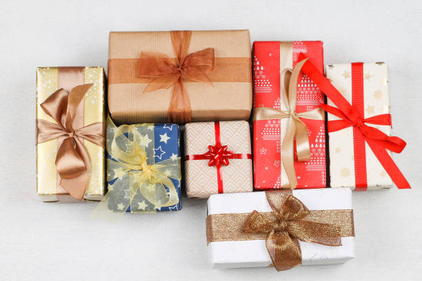 istock The gift boxes of different colors with bows. 1187014712