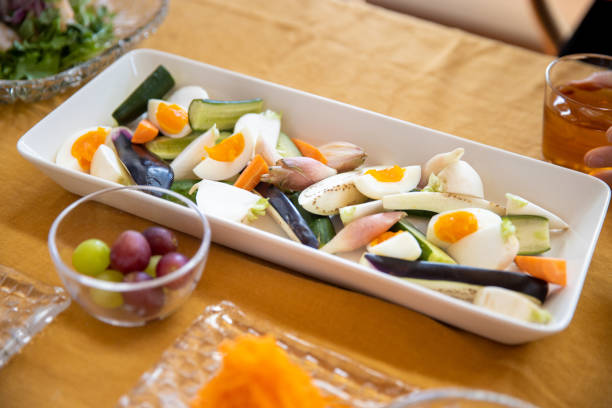 Salad and fruit on table for lunch party