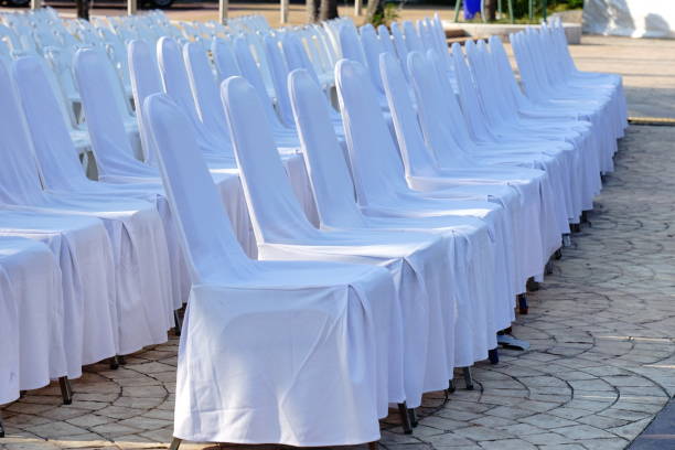 istock Outdoor Lots of white plastic chairs 1187015886