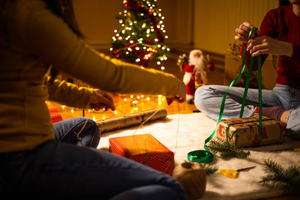 istock Final touches of wrapping Christmas presents 1187017523