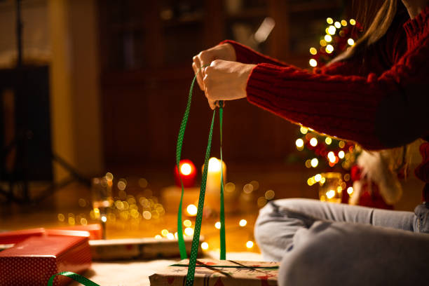 istock Final touches of wrapping Christmas presents 1187017587
