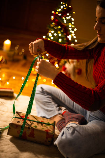 istock Final touches of wrapping Christmas presents 1187017623
