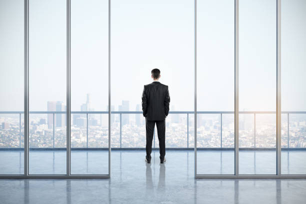 istock Businessman in contemporary office interior 1187017831