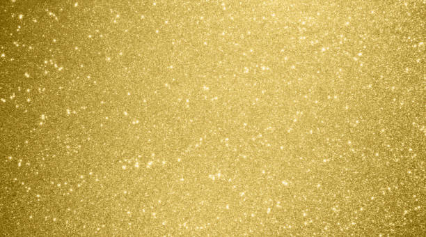 istock Abstract gold glitter sparkle bokeh light background 1187019640