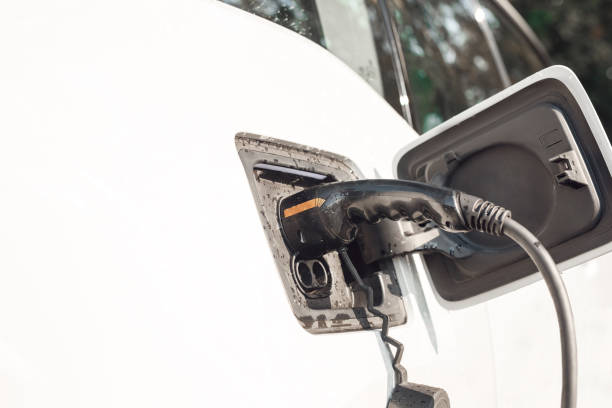 istock Ev charging power cable supply plugged in electric car 1187019825