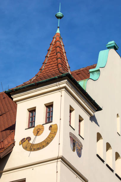 A sundial creating the effect of a smile, located on a building on Hauptmarkt in the city of Nuremberg, Germany.