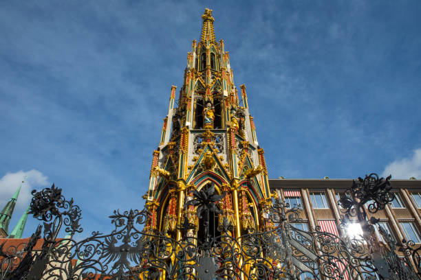 A view of the stunning Schoner Brunnen, known as the Beautiful Fountain in English, located in the city of Nuremberg in Germany.
