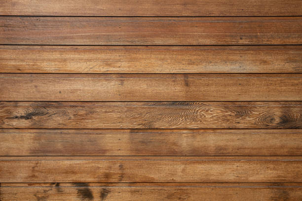 istock Treated wooden planks fence - abstract background with copy space 1187032972