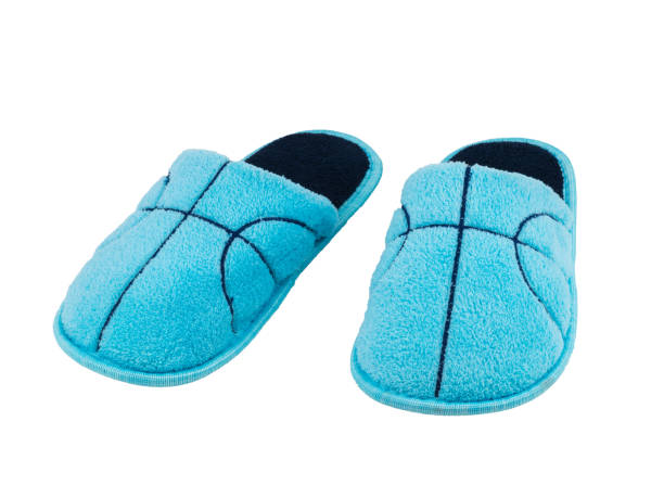 istock Home Slippers made of soft material isolated on a white background. 1187036983