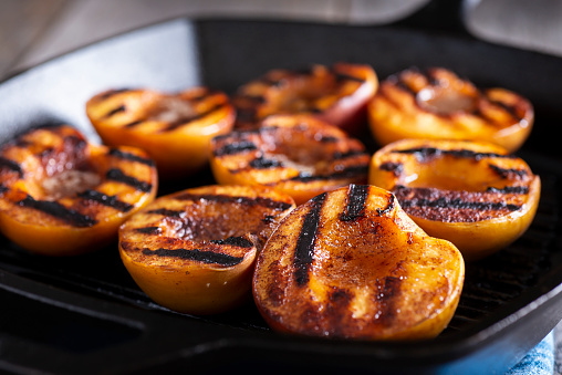 Grilled Peaches with Cinnamon and Honey in a Cast Iron Grill Pan