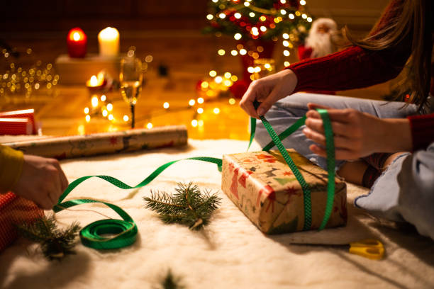 istock Final touches of wrapping Christmas presents 1187039613