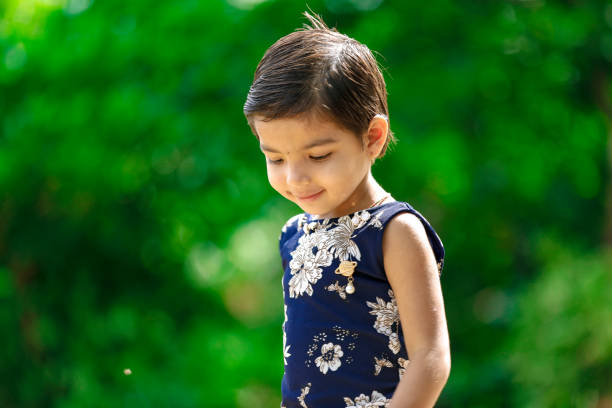 istock cute indian girl child 1187050830