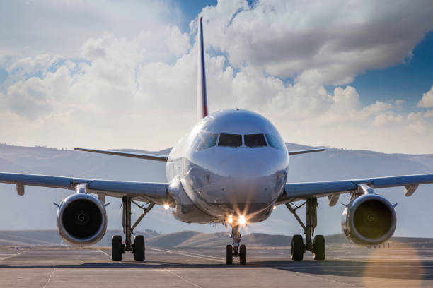 istock Front-view of Passenger Arplane On Airport Runway 1187055623