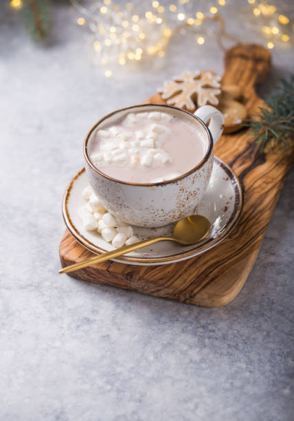 istock Hot chocolate cacao drinks with marshmallows in Christmas mug on grey background. Traditional hot beverage, festive cocktail at X-mas or New Year 1187060504