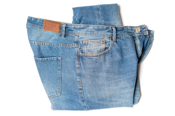 istock jeans on the background, blue jeans lisolated on white background 1187060939