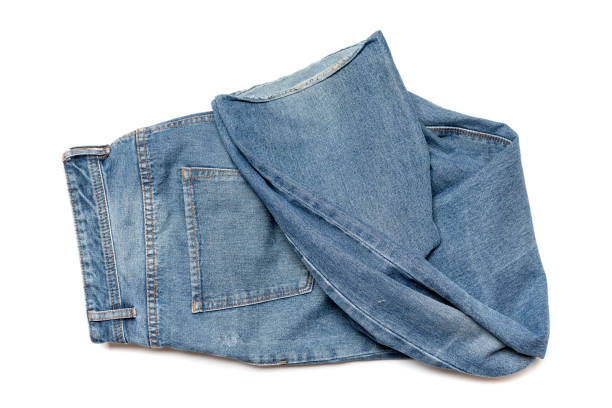 istock jeans on the background, blue jeans lisolated on white background 1187060940