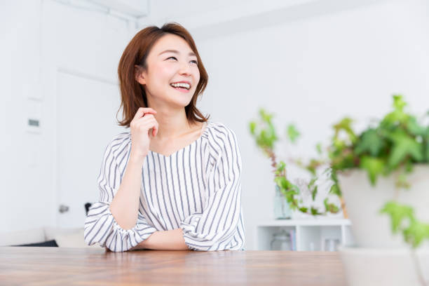 istock asian woman relaxing 1187061603