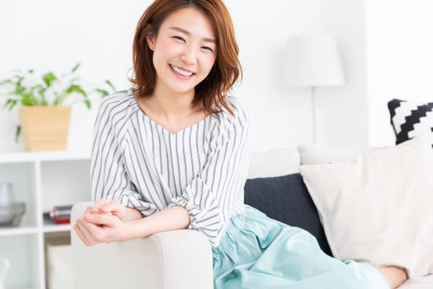 istock asian woman relaxing 1187061624