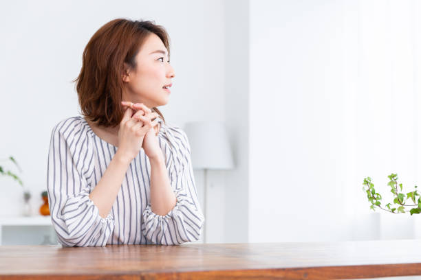 istock asian woman relaxing 1187061667