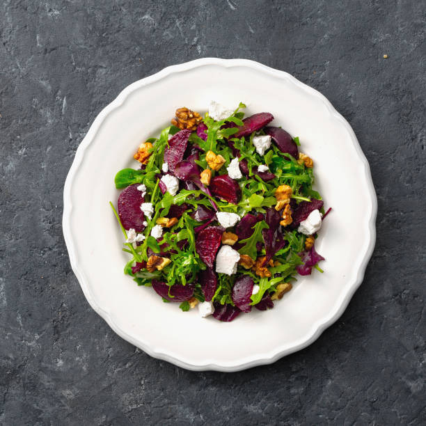 istock Salad plate on dark background top view 1187064814
