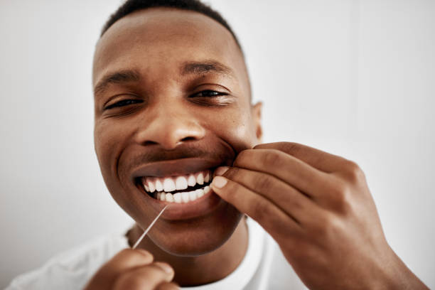 istock Floss for cleaner, healthier teeth 1187064879