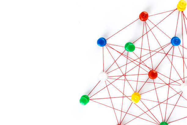 istock Network connection made from push pins and thread on blue background, close-up. 1187065298
