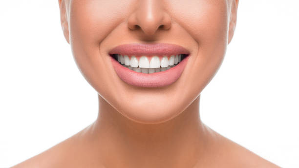 happy smiling woman with perfect teeth close up view dental health concept