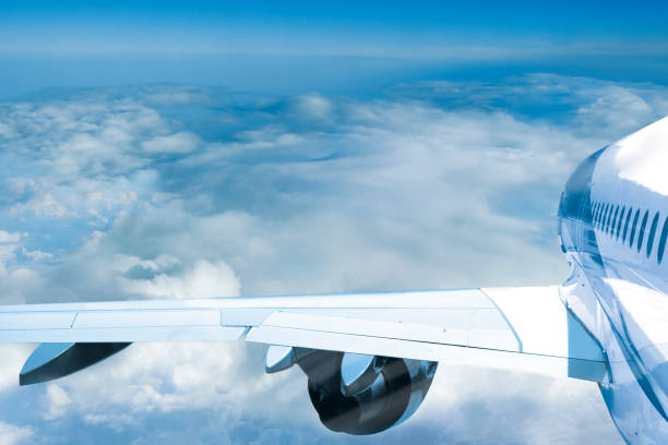 istock Passenger jet plane flies above the clouds 1187083509