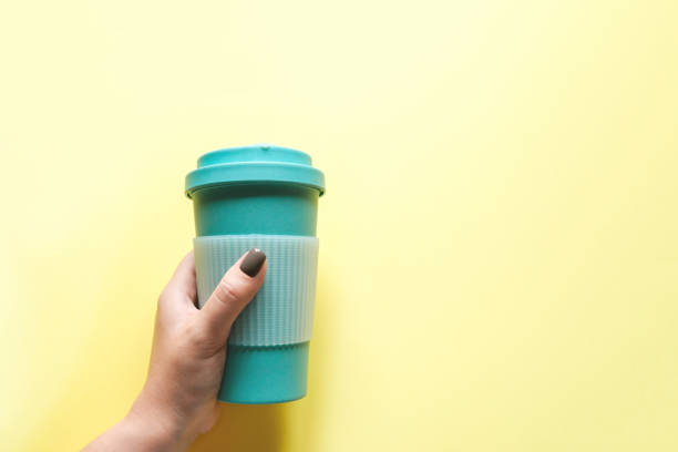 istock Mint coffee mug in a woman's hand 1187086284
