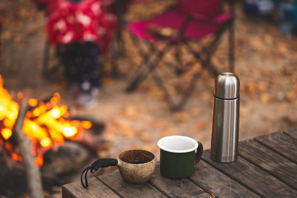 istock tea coffee and thermos at campsite 1187090235